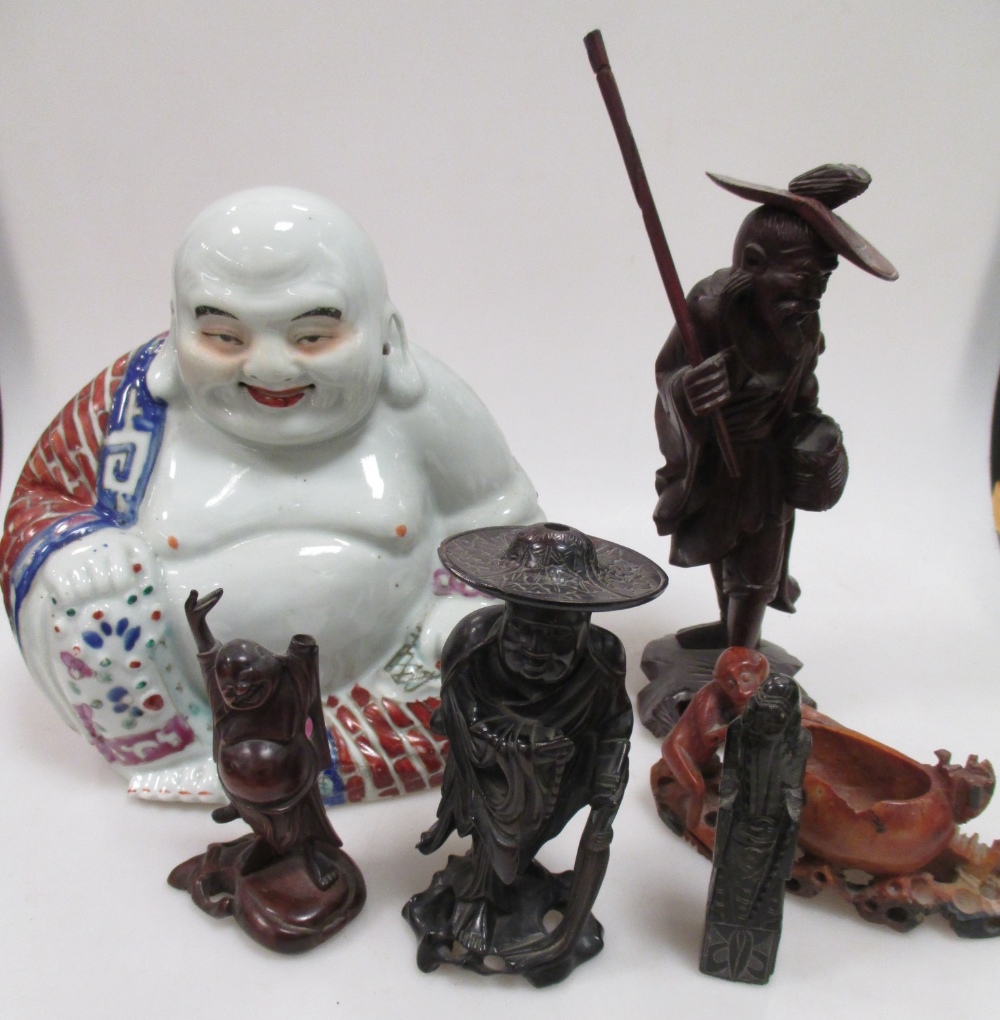 A group of Oriental figures, including Buddha