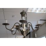 A French brass six branch chandelier