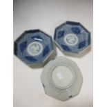 Three Japanese Arita blue and white octagonal dishes, 15cm wide