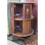 An Edwardian inlaid revolving bookcase, 54 x 91cm