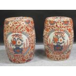 A pair of 20th century Japanese Imari palette barrel shaped garden seats, 48 cm high (2), From the