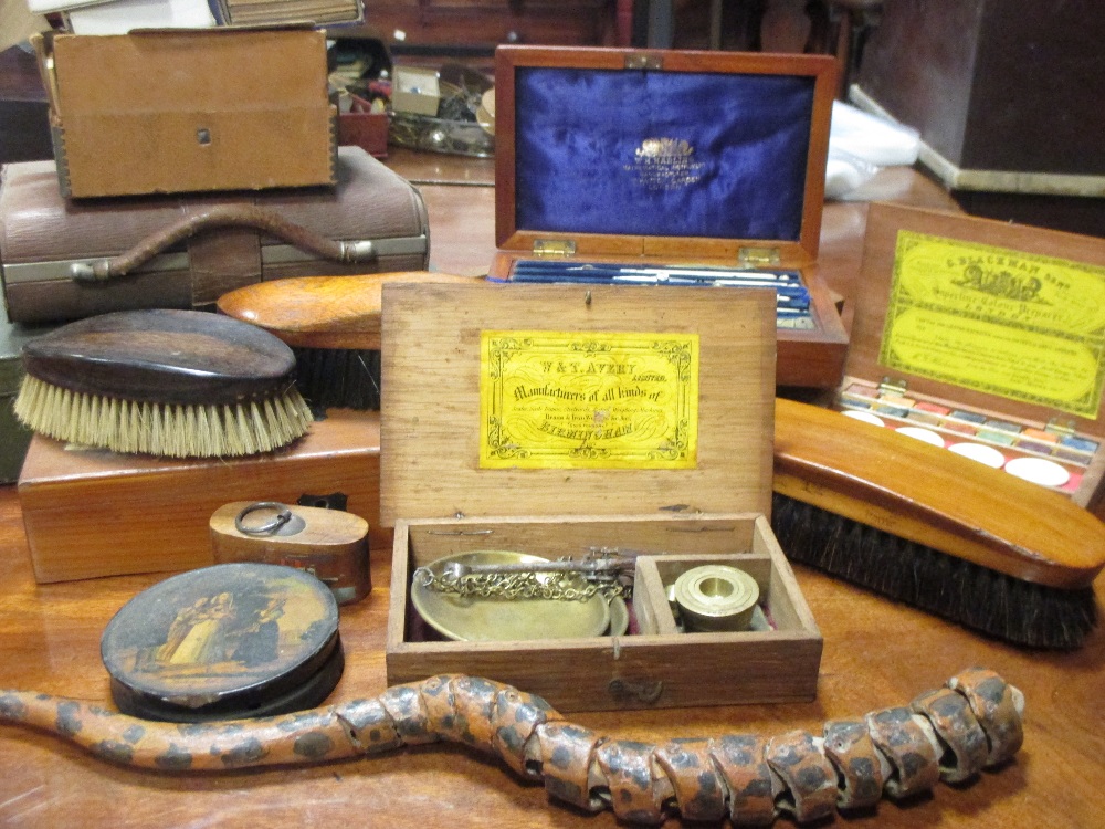 A quantity of assorted bygones, to include drawing instruments, playing cards, brushes, boxes,