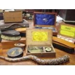 A quantity of assorted bygones, to include drawing instruments, playing cards, brushes, boxes,