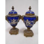 A pair of 19th century gilt mounted cassolette Urns, one with small damage