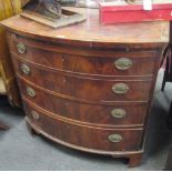 A George III mahogany bow fronted chest with brushing slide, 94cm high x 94cm wide