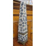 A pair of blue and white decorative obelisks, 58cm high