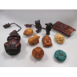 A Japanese wood lacquer netsuke and other carvings