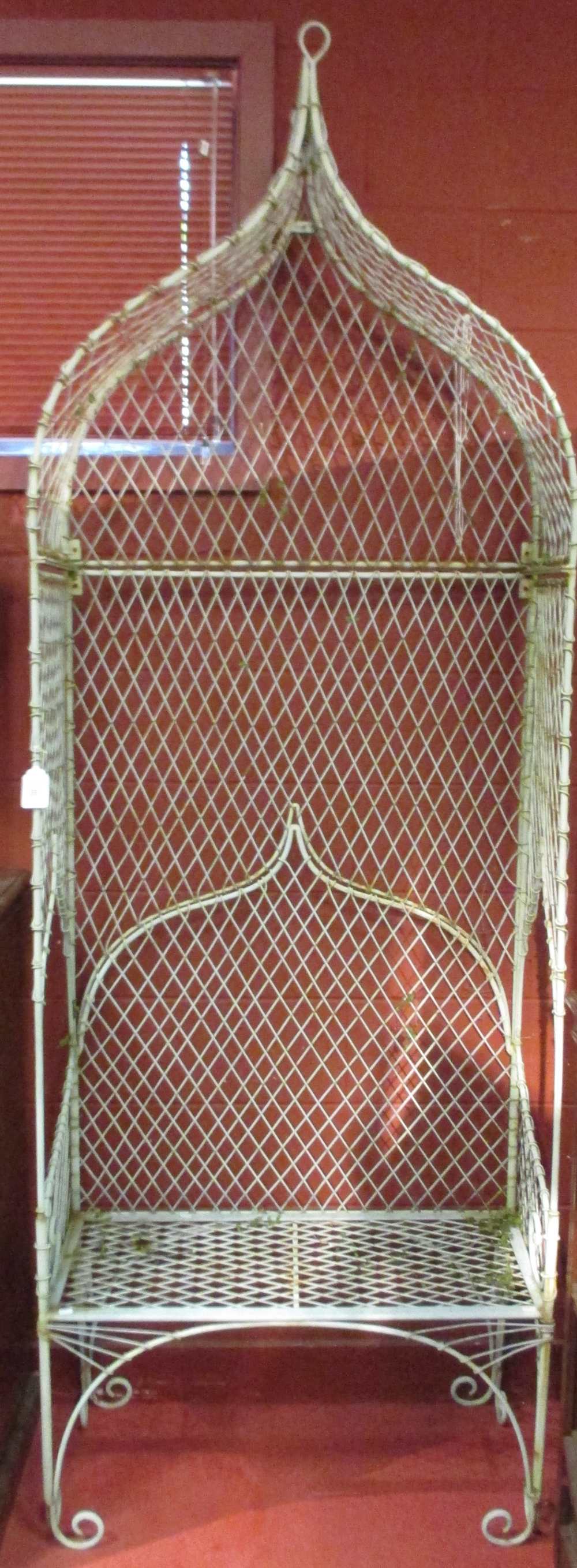 A painted wire work garden arbour, 265 (h) x 90 (w) x 43cm (d). From the collection of the late