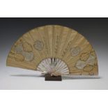 A mother of pearl handled hand painted fan