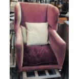 A 19th century mahogany framed deep wing armchair with draw out foot rest, 109cm high x 67cm wide