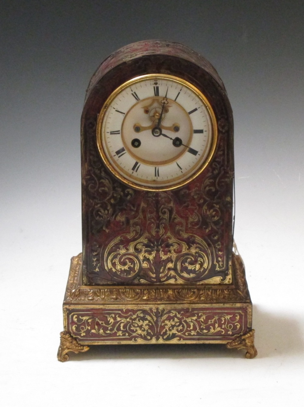 A late 19th century Boule inlaid mantle clock with eight day movement