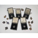 Five early 20th century silver golf medals, all unused and in 'Westgate-on-sea Golf Club' boxes,