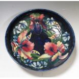 A Moorcroft iris pattern bowl, 22cm diameter