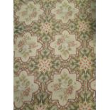 A green ground Aubusson needlework carpet, 415 x 300cm