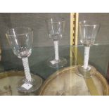 Three 18th century opaque twist wine glasses