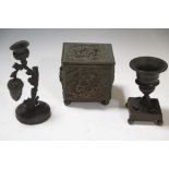 An early 18th century bronze pastel burner/candlestick, another part pastel burner, and a brass