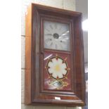 An American wall clock by the Waterbury Clock co.