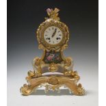 A Paris porcelain cased clock with stand, possibly Jacob Pettit, with silk suspension drum movemwent