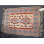 A pink and blue small Kilim rug - Provenance: From the collection of Christopher Hogwood, CBE