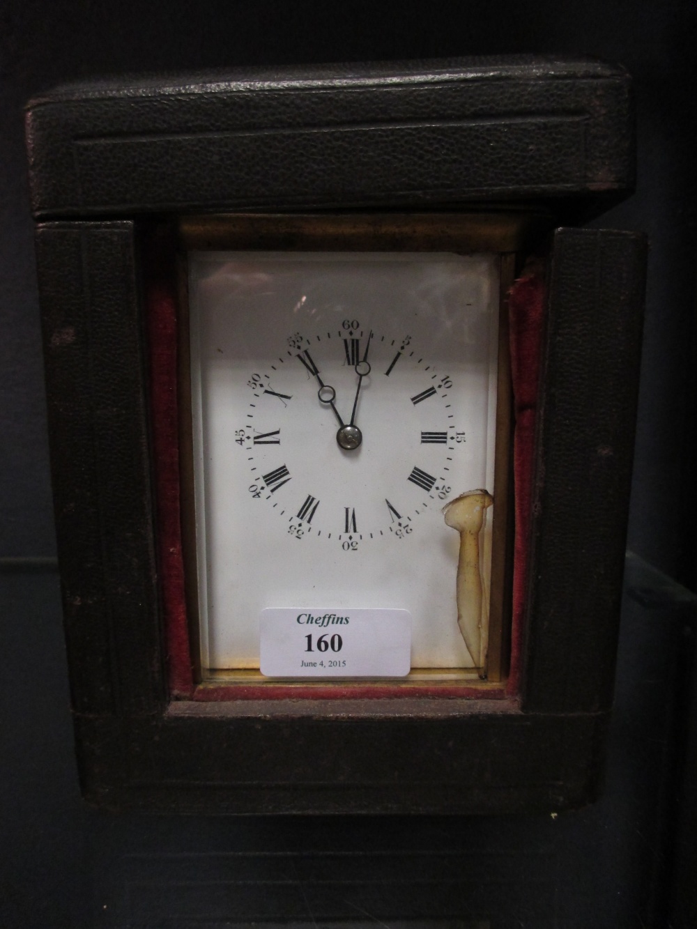 A brass carriage clock with repeat, unsigned, rectangular enamel dial, moon hands, 14cm high,