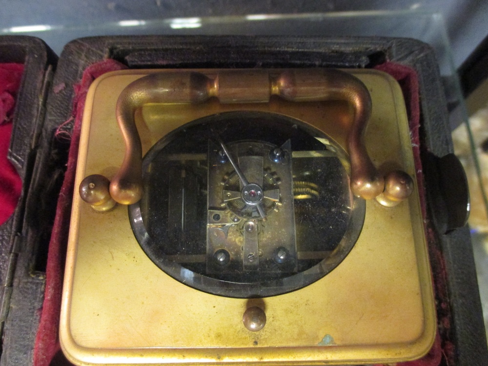 A brass carriage clock with repeat, unsigned, rectangular enamel dial, moon hands, 14cm high, - Image 2 of 2