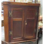 A 19th century corner cupboard