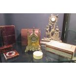 A gilt brass clock case with a J. Williams of Dublin watch movement, another watch holder, a