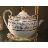 An 18th century gilt and floral decorated teapot and stand (some rubbing to gilding) by Flight