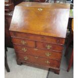 A reproduction bureau on bracket feet