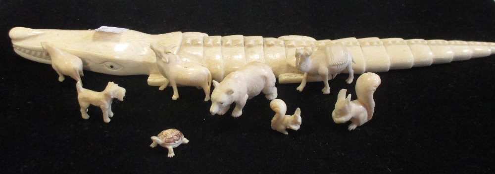 A quantity of late 19th and early 20th century ivory items and other other materials (11)