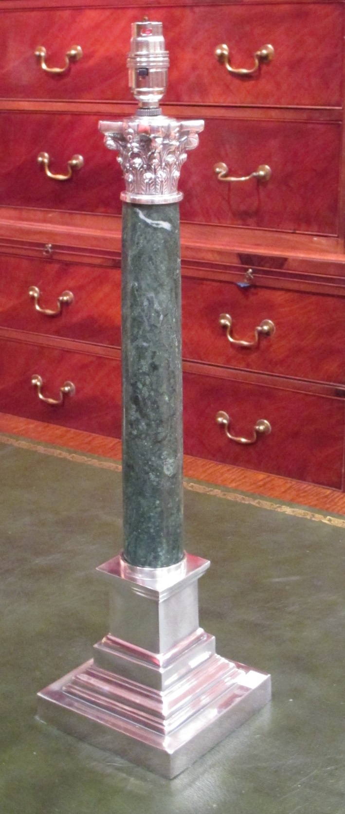 A pair of silverplated & green marble Corinthian column table lamps