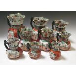 A graduated series of Masons Ironstone Jugs, typical decoration, largest repaired (9)