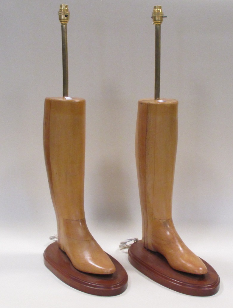 A pair of lamps in the form of boot trees