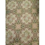 A green ground Aubusson needlework carpet, 415 x 300cm Overall in average condition a bit yellow and