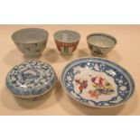 Tek Sing cargo and other bowls, a blue and white porcelain box and a famile rose saucer