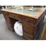 A late Victorian oak pedestal desk, 76cm high x 109cm wide