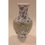 A famille rose vase bound by a scarf, seal mark of Jiaqing, 24cm high