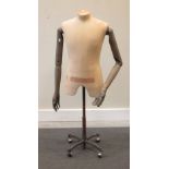 A tailor's mannequin, with posable arms