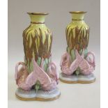 A pair of Worcester vases, dated 1863, the yellow bodies gilt and moulded with bulrushes above