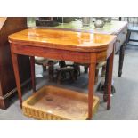 A 19th century mahogany D-shaped card table on square tapered legs and spade feet, 75cm high x