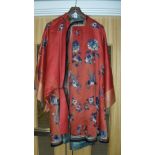 A Chinese rich terracotta ground full length robe