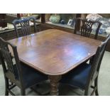 A late Victorian mahogany wind out dining table, with one leaf, 116 x 153cm (fully extended)