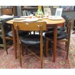 A Danish teak dining table and six G-Plan chairs