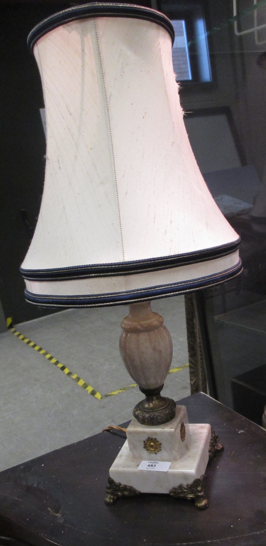 A pair of table lamps, together with two others and a lazy Susan