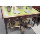 A late Regency mahogany library table, inset green leather with drawers and dummy verso, on turned