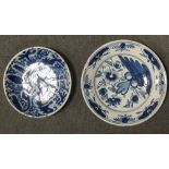 An 18th century English Delft blue and white plate together with a plate painted with a lion