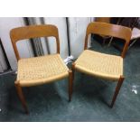 A pair of Danish teak dining chairs by Niels Moller, each with shaped back and woven seats (2)