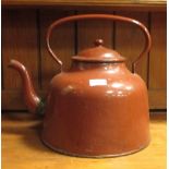 A large brown enamel kettle