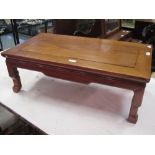 A Chinese hardwood coffee table, 26 x 77 x 41cm