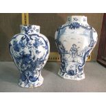 Two late 18th/early 19th century Dutch Delft blue and white vases, 22.5 and 19cm high (2)